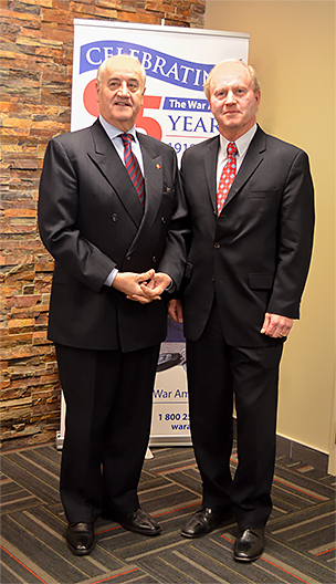 The Honourable Julian Fantino, Minister of Veterans Affairs (left), and Brian Forbes, Chairman of The War Amps Executive Committee.